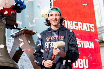 college student ringing DBU bell
