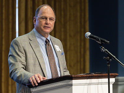 Raymond Harris speaking at the Christian Leadership Summit