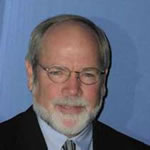 dr david naugle headshot with blue background