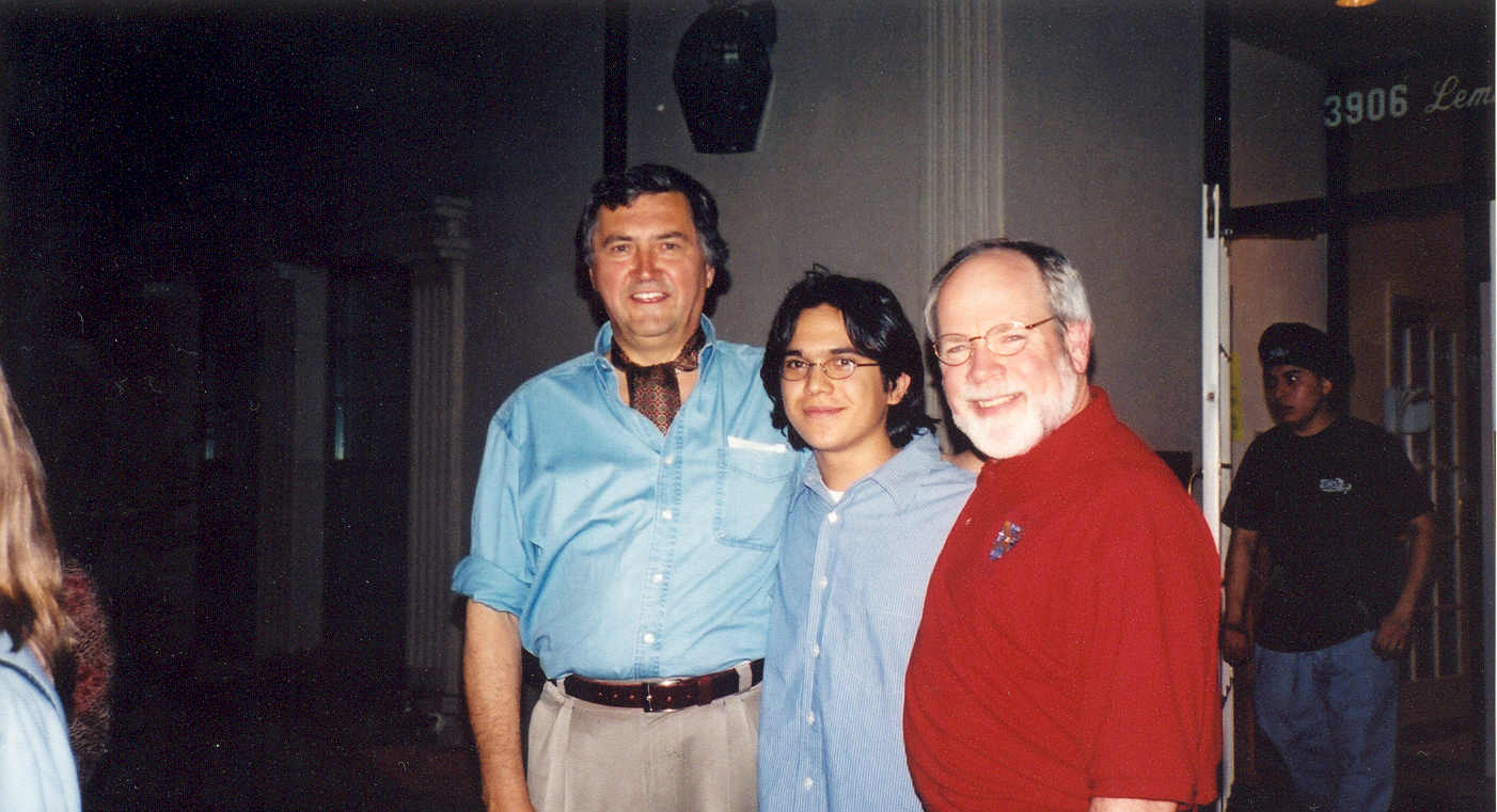 picture of Paul Marshall posing with a student and Dr. Naugle