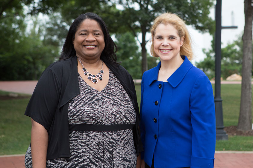 Dr. Michelle Henry (left) as the new Chair of the English Department. Outgoing Chair Dr. Mary Nelson (right) - Dallas, Texas