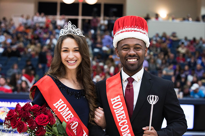 The Homecoming King and Queen pose for a photo