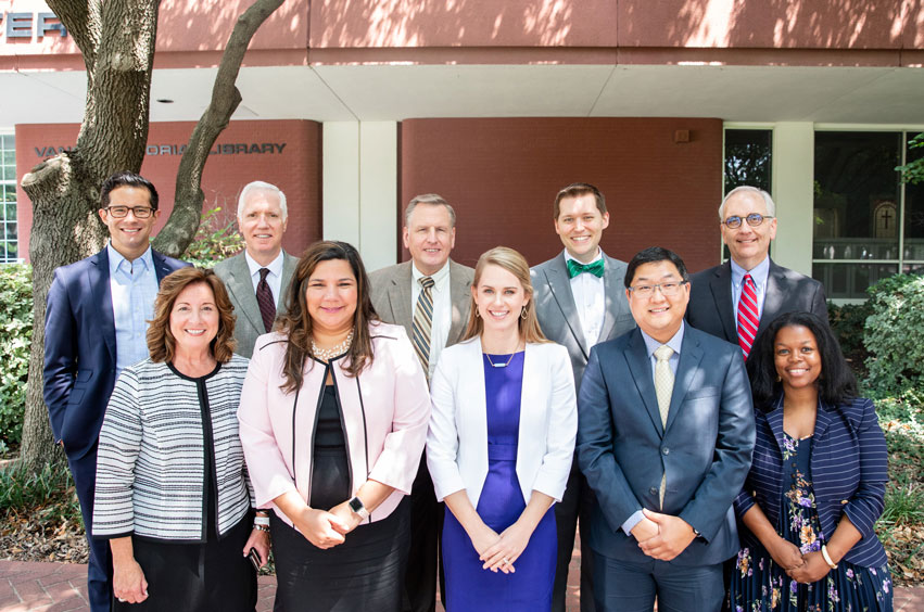 Dr. Norma Hedin, Provost,  with new faculty members