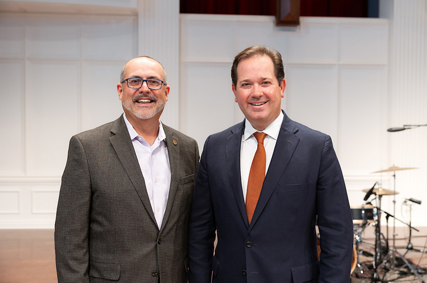 Julio Guarneri and Dr. Adam Wright standing in the chapel