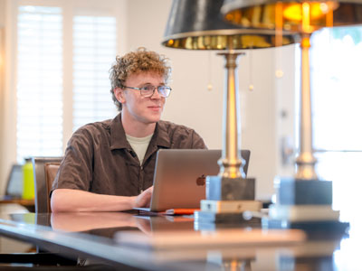 DBU student studying on campus in the DBU coffeehouse