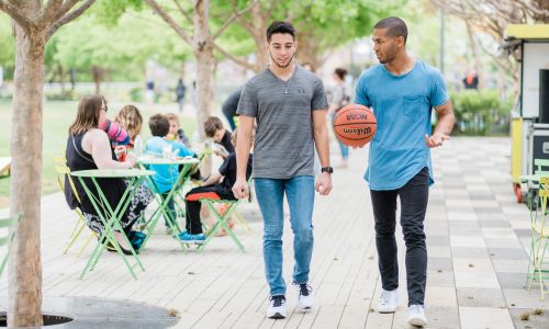 College students walking in a park