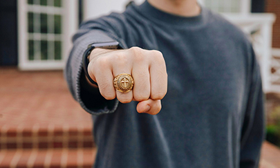 alumni wearing cross ring