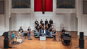 A pop/rock band performing in a church setting