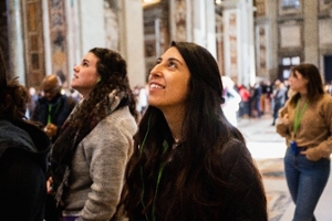 picture of a woman admiring a building