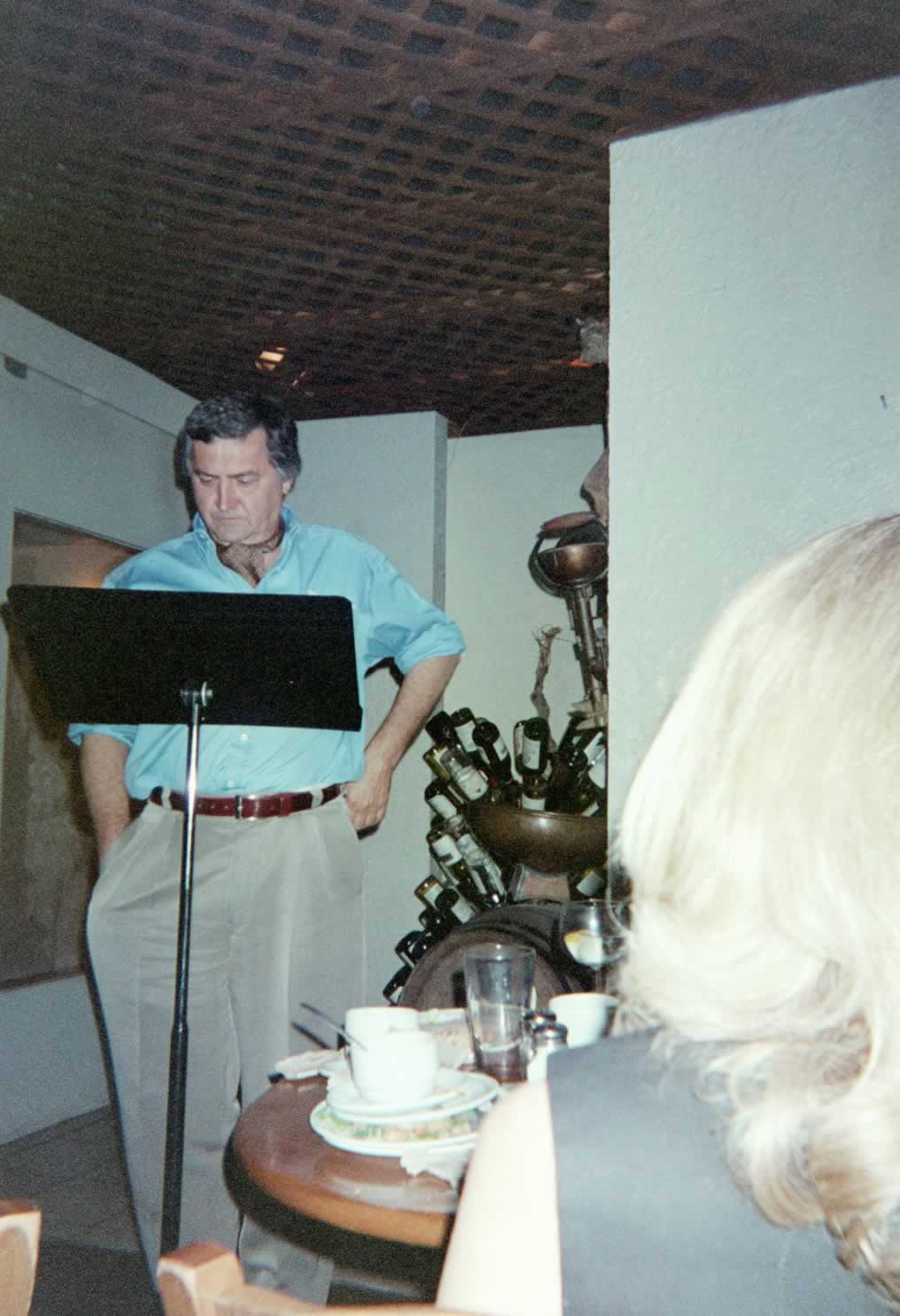 picture of Paul Marshall standing behind a music stand