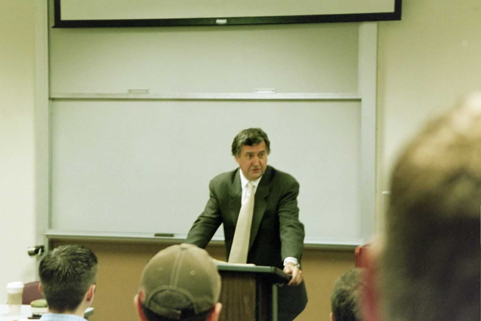 picture of Paul Marshall speaking in a classroom in front of a podium