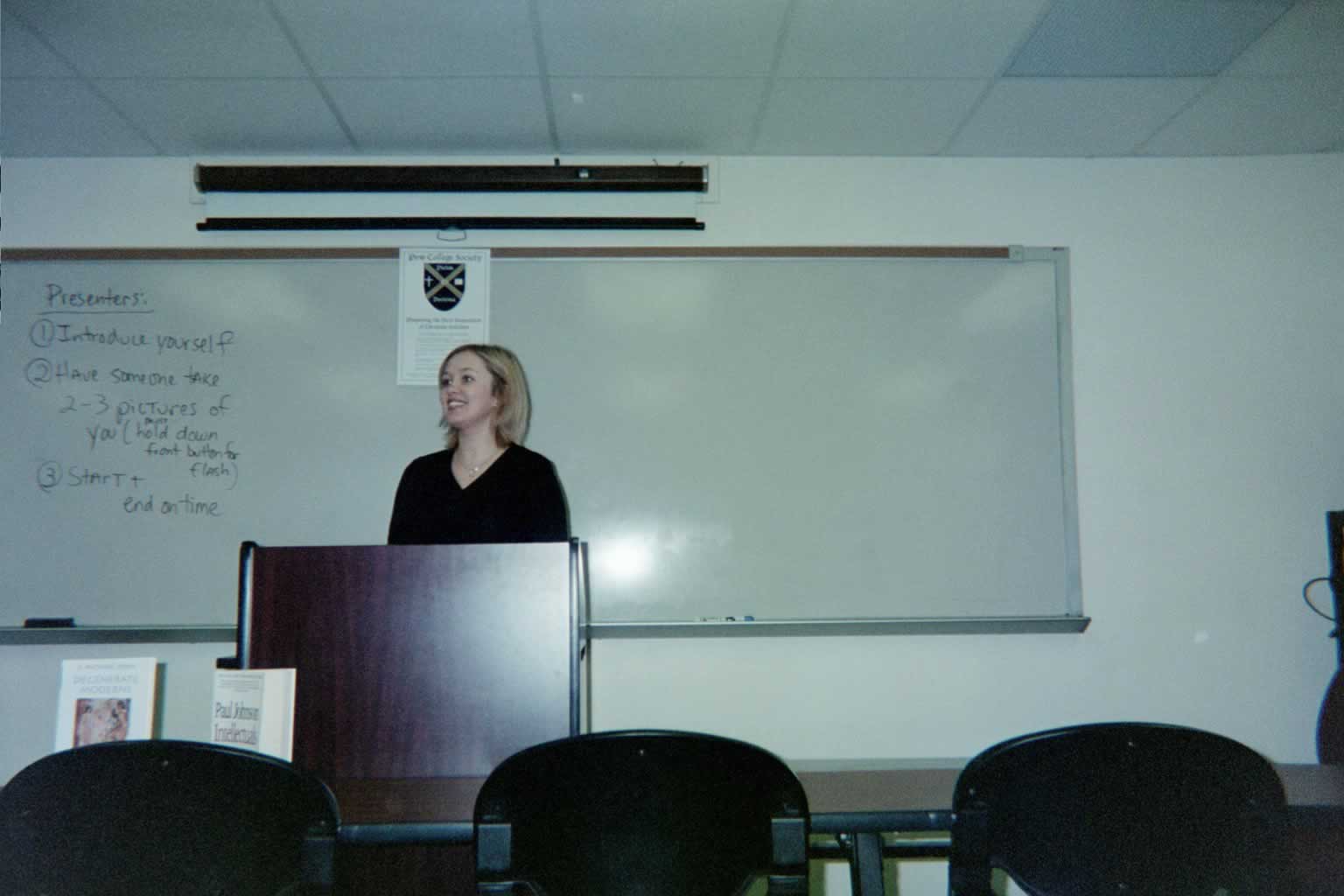 picture of a woman speaking behind a podium