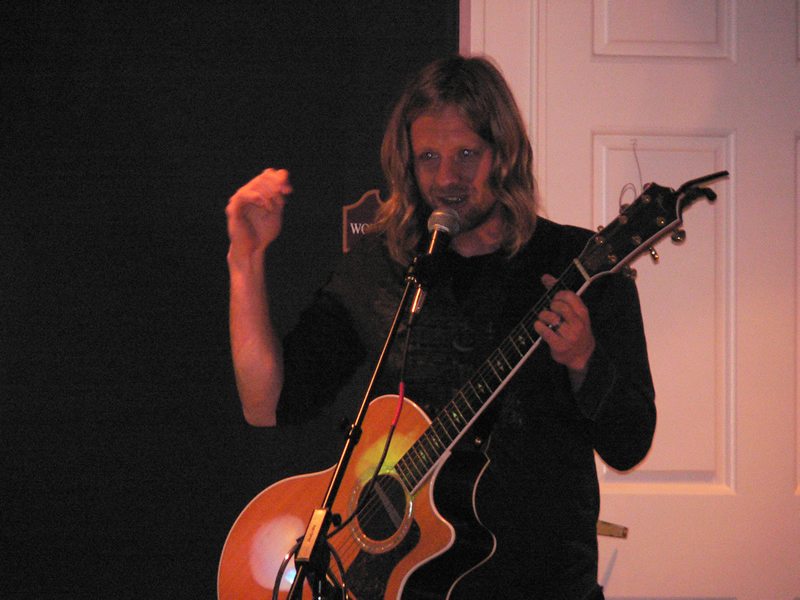 picture of Jon Foreman speaking into a microphone