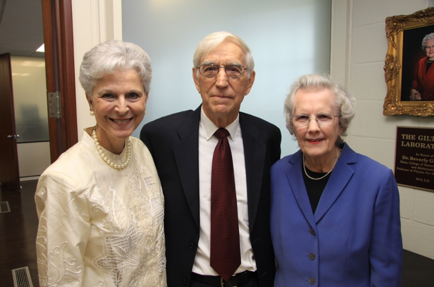 Dr. Glitner standing with other faculty members