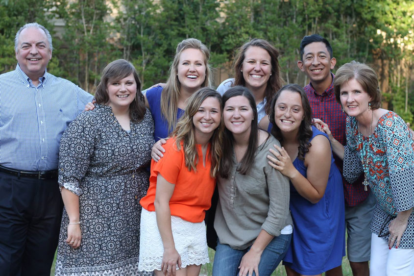 Dr. Bob Brooks, Dean, and Dr. Shelley Melia pose with a group of sky ranch leaders