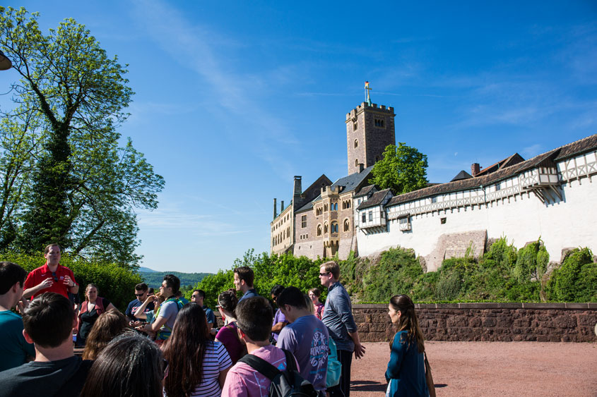 David Cook, J.D. lecturing students in front of Wartburg Castle