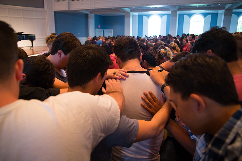 DBU students pray for fellow students impacted by Hurricane Harvey during Chapel on August 28, 2017 | Dallas, Texas