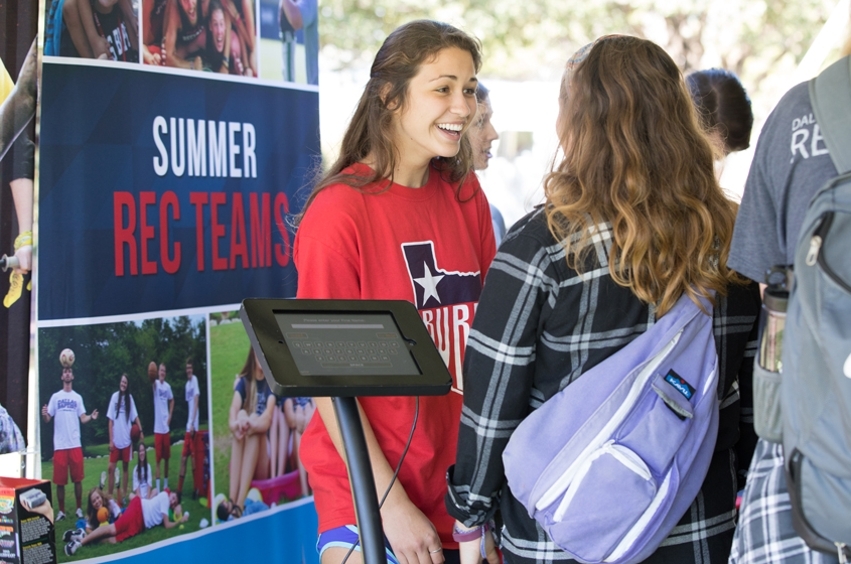 A DBU Student talks to another about the DBU rec team