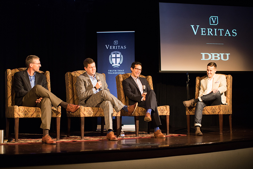 A panel discusses culture on the stage of the Vertias event