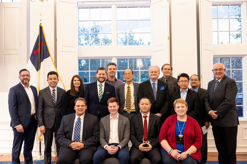 group of students and faculty at the herb robbins symposium