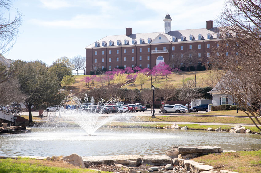 spence hall on the dbu campus in springtime