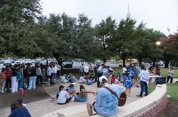 DBU Students praying and worshiping on the Quad on the DBU campus in Dallas