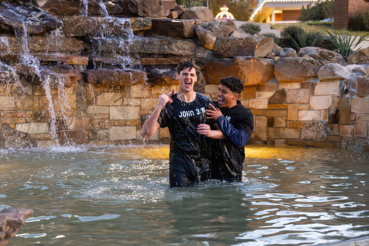 DBU college students being baptized in the Pool of Bethesda on the DBU campus in Dallas, Texas