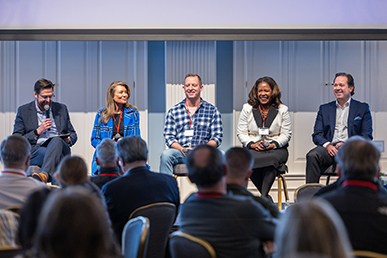 Nexus Conference panel of people talking to crowd in Dallas, Texas