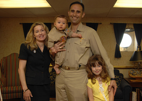 Bridget Reis as a child with her father, mother and sibling