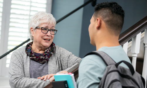 student and professor talking