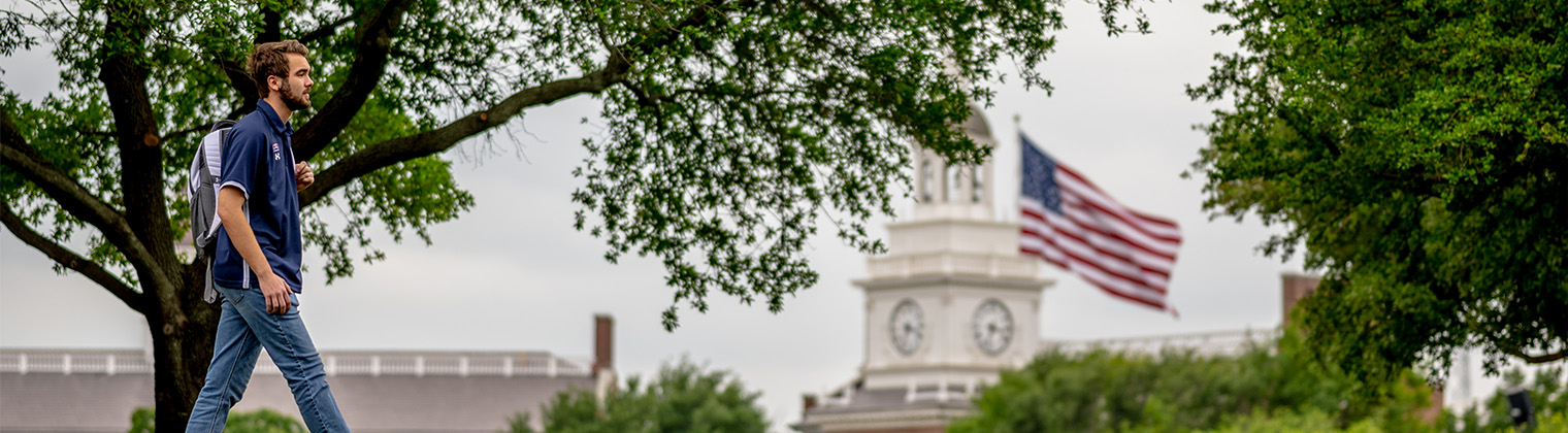 DBU student walking on campus